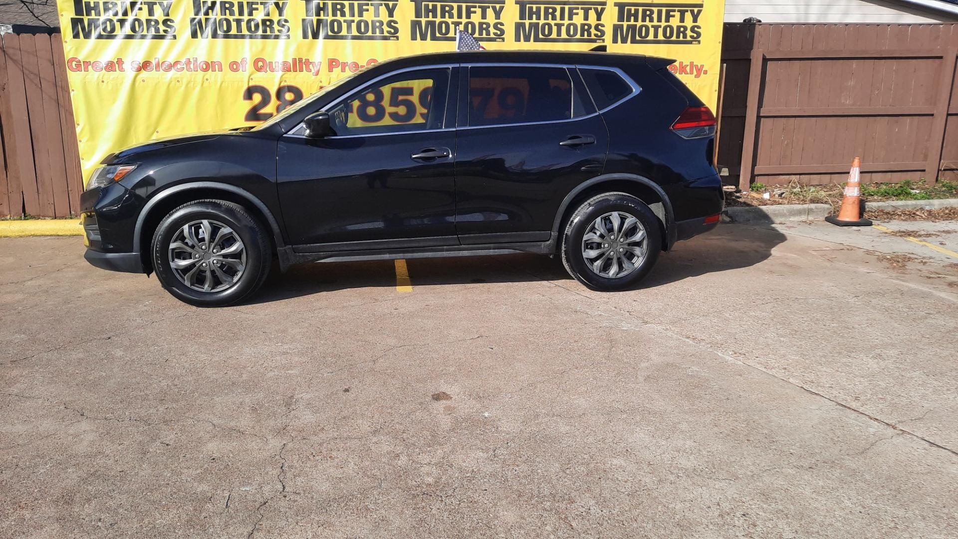 2017 Nissan Rogue (JN8AT2MV0HW) , located at 16710 Clay Rd., Houston, TX, 77084, (281) 859-7900, 29.834864, -95.656166 - Photo#2